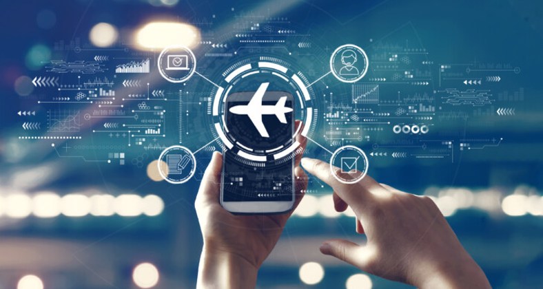 Flight ticket booking concept with person using a smartphone